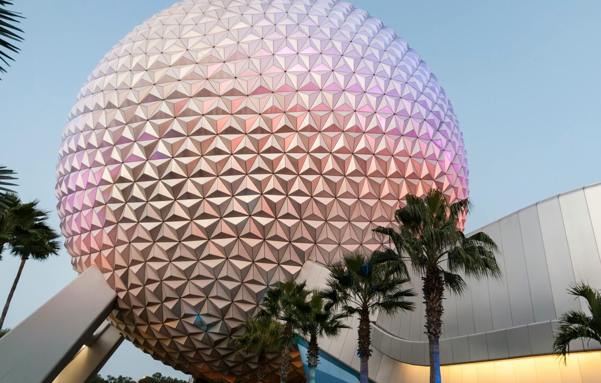 Iconic geodesic sphere, Spaceship Earth, at Epcot Center against a clear sky.